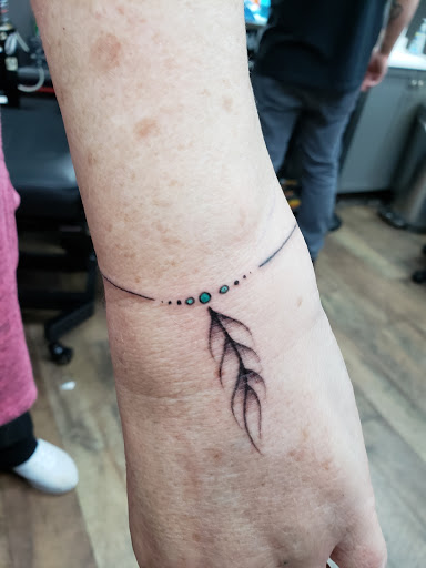 Explore lower arm half sleeve tattoo ideas, creative tattoo ideas in Bristol, available at Sacred Ink