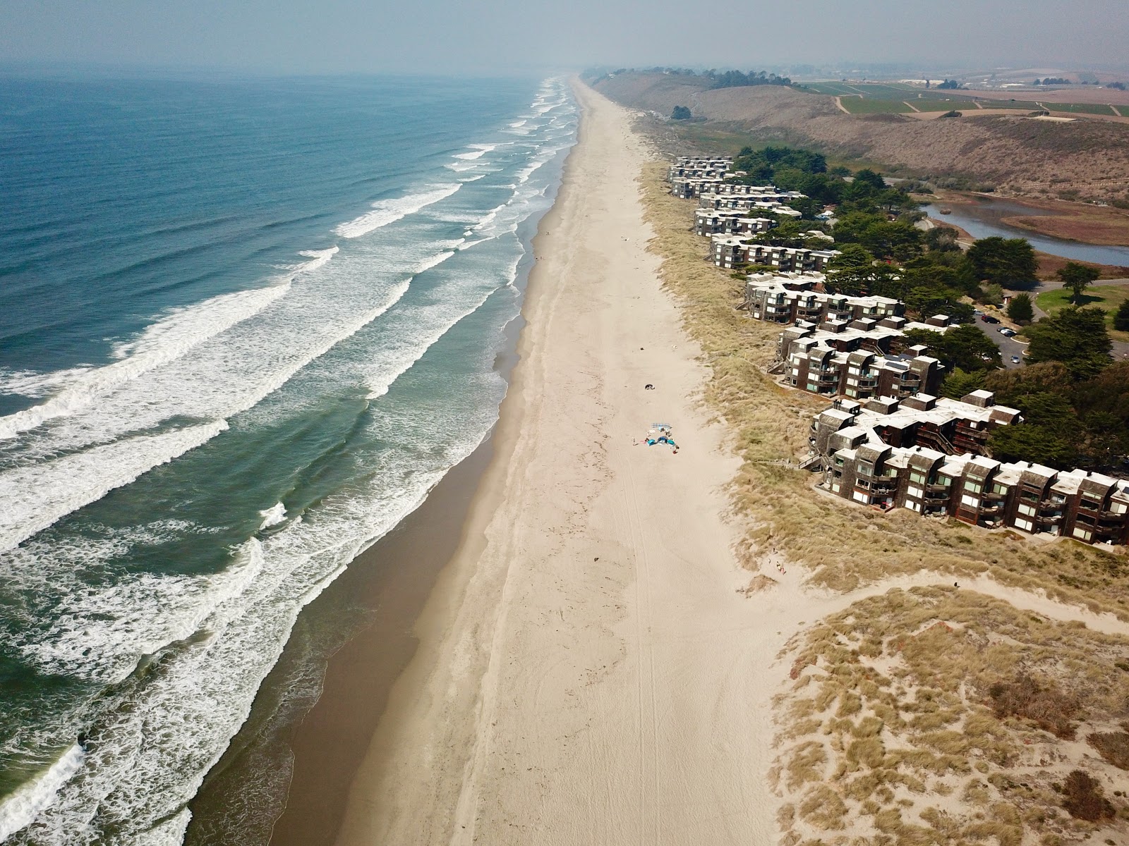 Foto von Sunset Beach mit langer gerader strand