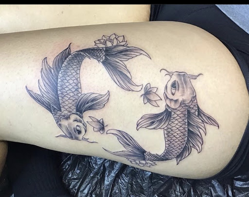 Explore mens rose tattoo ideas, creative tattoo ideas in Keyport, available at Taboo Tattoos