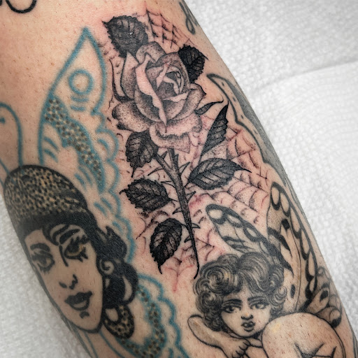 Explore swan tattoo ideas, creative tattoo ideas in Atlanta, available at Big Cat Tattoo