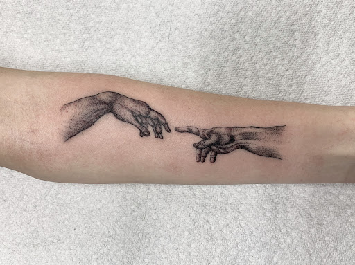 Explore tattoo father daughter ideas, creative tattoo ideas in Matthews, available at Divine Arts Tattoo Company