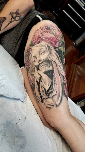 Explore back arm tattoo ideas for guys, creative tattoo ideas in Alhambra, available at IFA2 Tattoo Studio