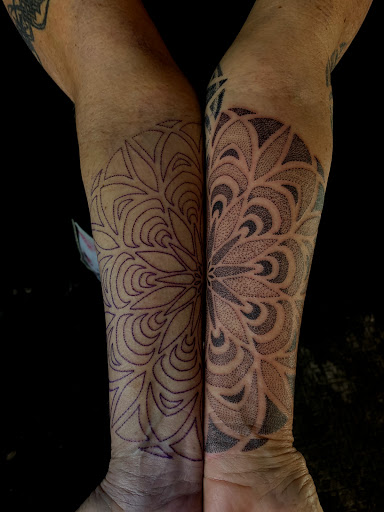 Explore neck tattoo ideas men, creative tattoo ideas in Mount Clemens, available at Hand & Heart Tattoo