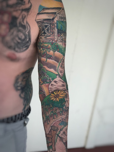 Explore watercolor flower tattoo ideas, creative tattoo ideas in Ocala, available at The Tattoo Gallery of Ocala LLC