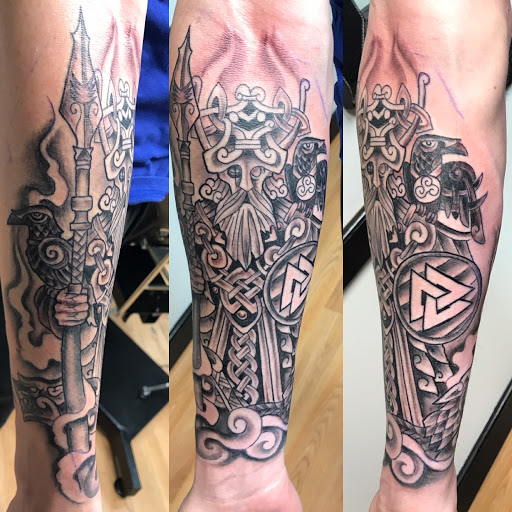 Find feminine skull tattoo ideas for your next unique tattoo in Tarpon Springs at Legendary Custom Tattoos and Piercings