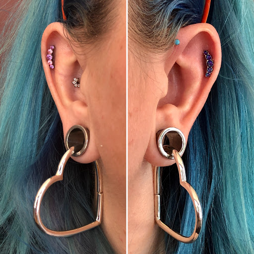 Explore neck tattoos for men ideas, creative tattoo ideas in Bloomington, available at Evil by the Needle Custom Tattoo and Piercing Studio