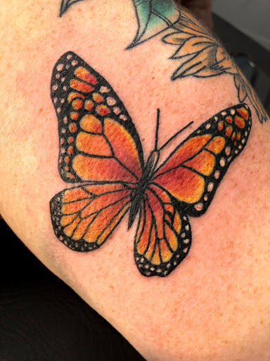 Explore tattoo ideas small flowers, creative tattoo ideas in Barberton, available at Magic City Tattoo Company