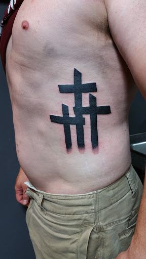 Explore simple tattoo ideas for guys, creative tattoo ideas in Foley, available at Black Sheep Custom Tattoos and Piercings