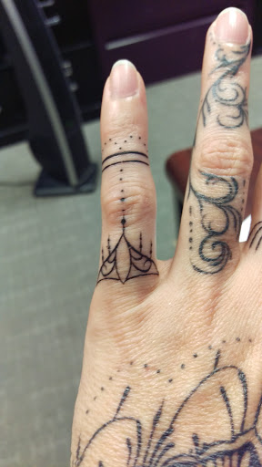 Explore wrist tattoo ideas for guys, creative tattoo ideas in Richmond, available at Loose Screw Tattoo