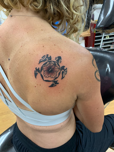 Explore chin tattoo ideas, creative tattoo ideas in Lahaina, available at Sweet Trade Tattoo