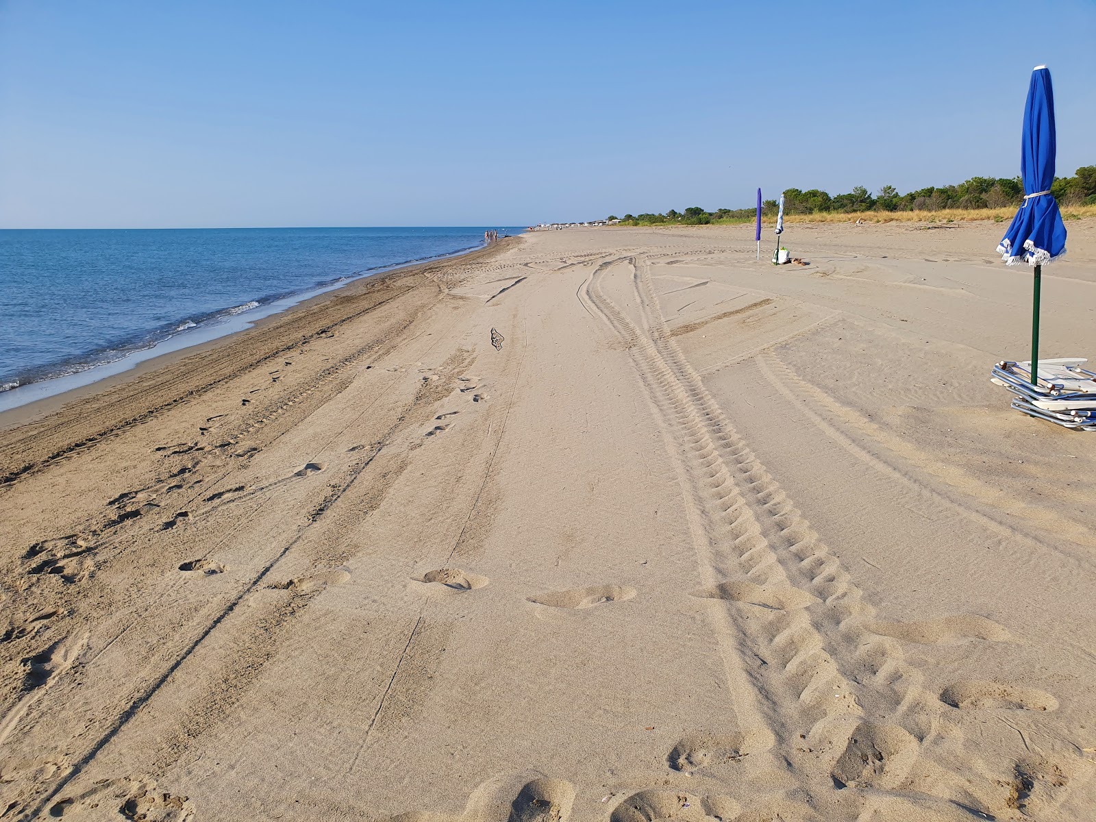 Foto de Lido di Scanzano beach com água azul superfície