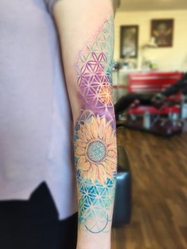 Explore foot tattoo ideas for female, creative tattoo ideas in Peoria, available at Iron Key Tattoo Studio Inc.