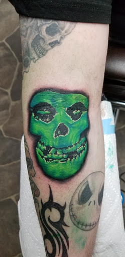 Explore male bicep tattoo ideas, creative tattoo ideas in Stetsonville, available at Solace Ink Company LLC