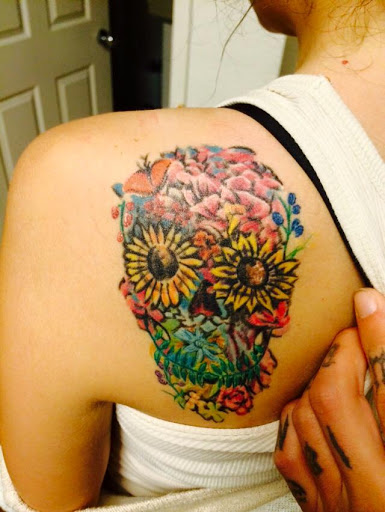 Find introvert tattoo ideas for your next unique tattoo in Colorado Springs at Skin Evolution Tattoo