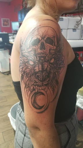 Explore marigold tattoo ideas, creative tattoo ideas in Chandler, available at Rad-A-Tat Tattoo