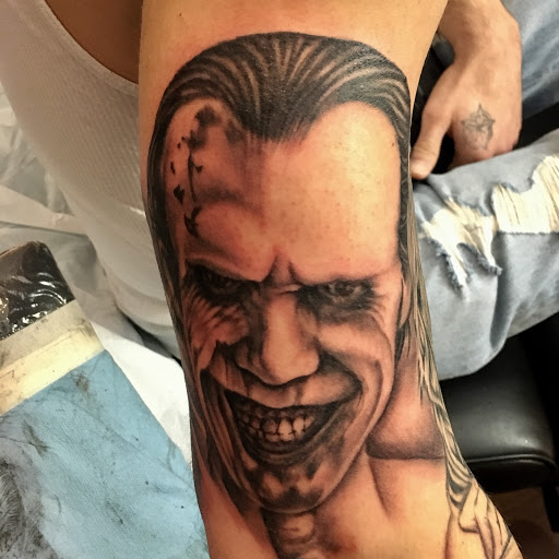 Explore tattoo cover up names ideas, creative tattoo ideas in Kingsford, available at Deft Tattoo Studio