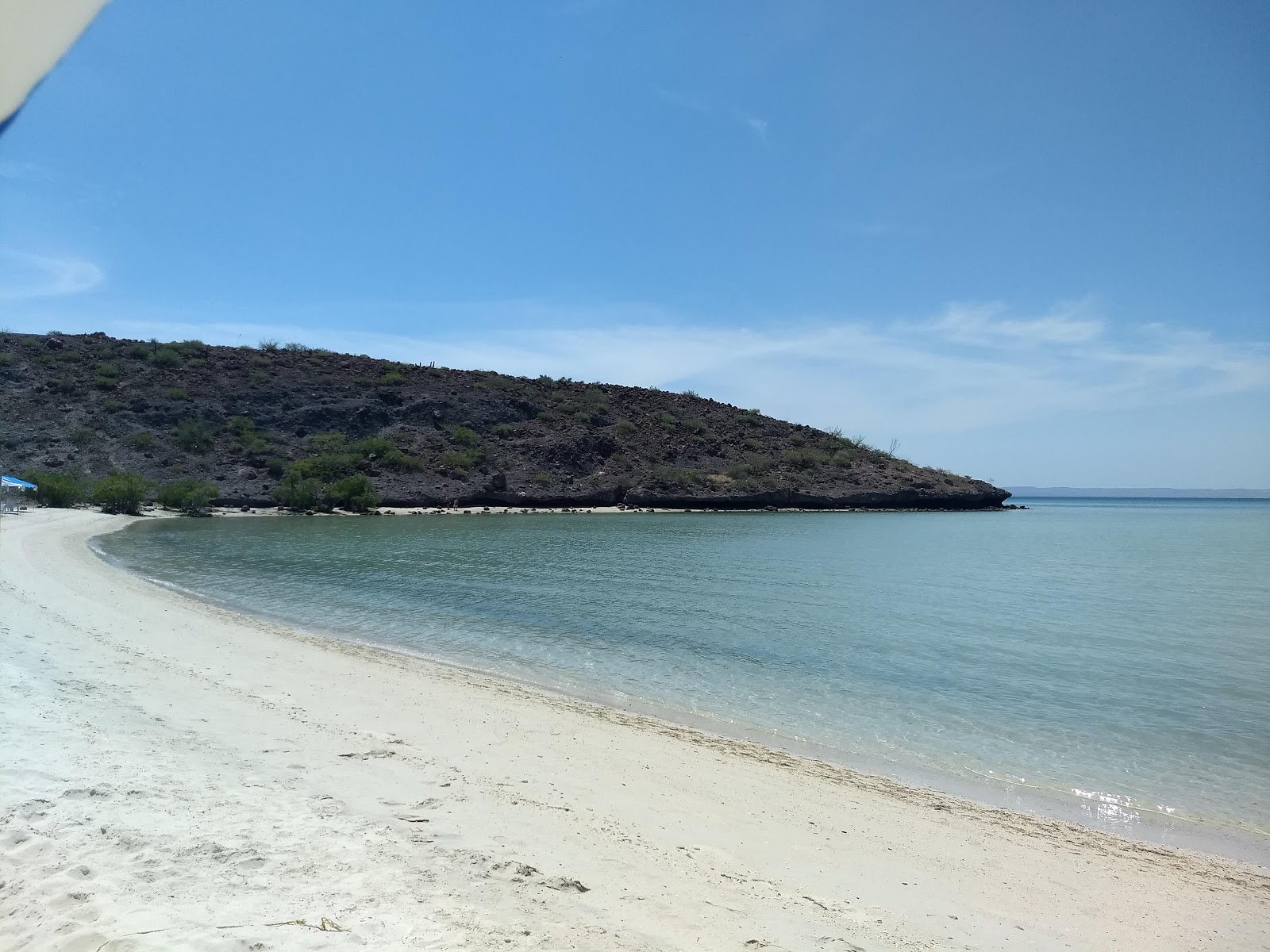 Foto av Playa El Tesoro med turkos rent vatten yta