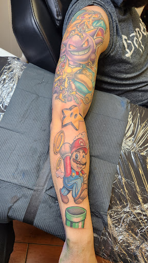 Explore transformers tattoo ideas, creative tattoo ideas in Stuart, available at Tiger Shark Tattoo Studio