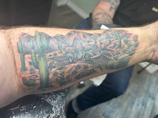 Find bracelet tattoo ideas for females for your next unique tattoo in Walworth at Bearded Buffalo Tattoo and Body Piercing