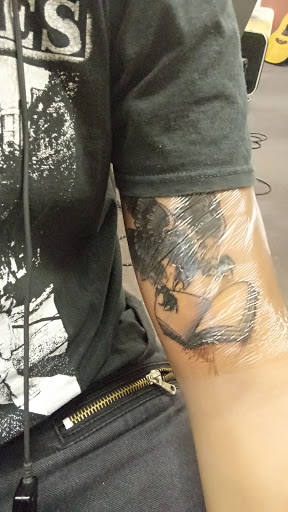 Explore green ranger tattoo ideas, creative tattoo ideas in Dunn, available at Heart and Hammer Tattoo Co.