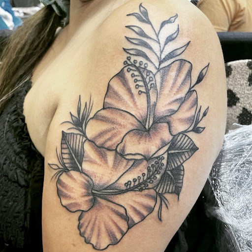 Find tattoo ideas roses for your next unique tattoo in Georgetown at One Love Tattoos