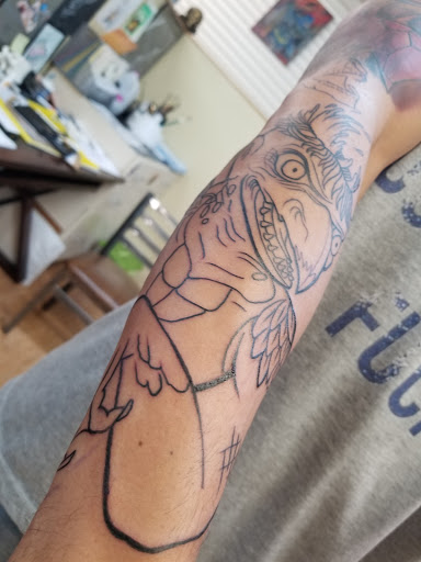 Explore david and goliath tattoo ideas, creative tattoo ideas in Rochester, available at Sacred Heart Studios