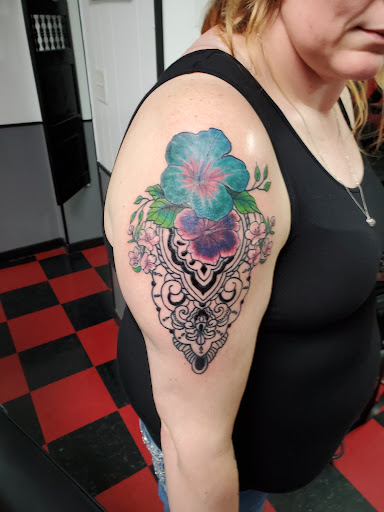 Explore name face tattoo ideas, creative tattoo ideas in Fort Dodge, available at Black Diamond Tattoo Studio