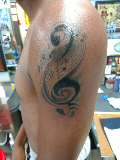 Explore taino tattoo ideas, creative tattoo ideas in San Antonio, available at Adrenaline Tattoo & Body Piercing