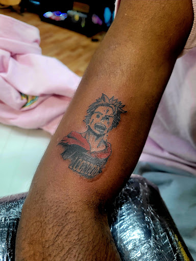 Explore compass tattoo cover up ideas, creative tattoo ideas in Benton, available at Spectrum Tattoo