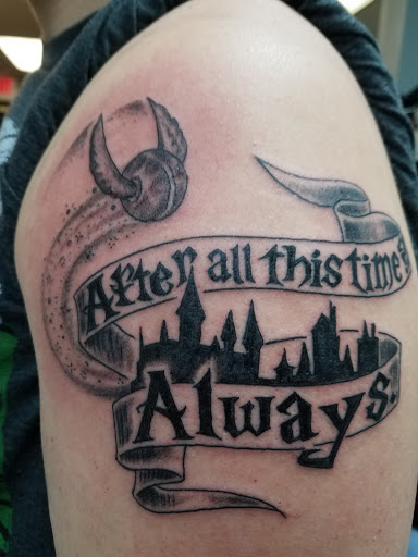 Explore toy story tattoo ideas, creative tattoo ideas in Libertyville, available at Art With Atattooed