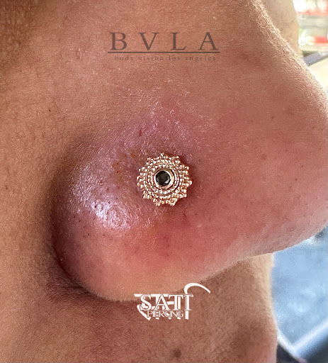 Find boyfriend name tattoo under breast ideas for your next unique tattoo in Roanoke at Sati Piercing & Fine Jewelry
