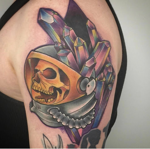 Explore religious elbow tattoo ideas, creative tattoo ideas in Tallmadge, available at Killjoy tattoo