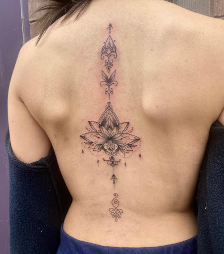 Explore red string of fate tattoo ideas, creative tattoo ideas in Peoria, available at Modern Ink Tattoo