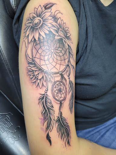 Explore tattoo ideas for someone who died, creative tattoo ideas in Angola, available at Hoodlum Ink