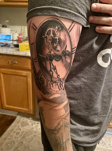 Explore script tattoo ideas for men, creative tattoo ideas in Goose Creek, available at Red Kirin Tattoo