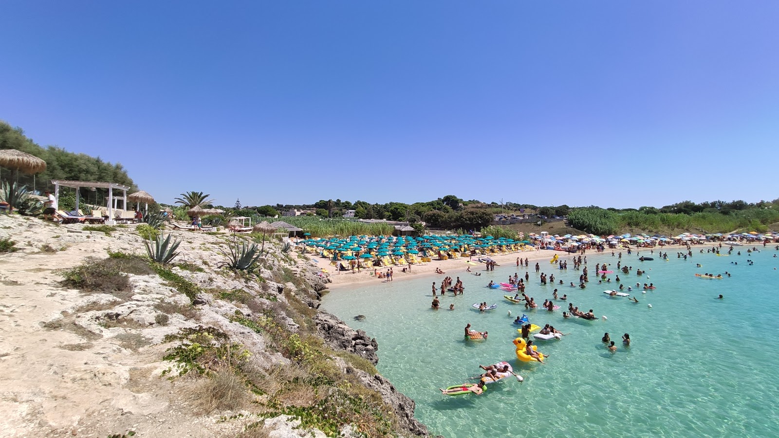 Canneto Plajı'in fotoğrafı - Çocuklu aile gezginleri için önerilir