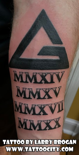 Explore forearm tattoo idea for men, creative tattoo ideas in Lockport, available at Tattoo City by Larry Brogan