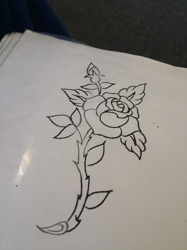 Find dragon tattoo ideas for men for your next unique tattoo in Youngstown at Artistic Dermagraphics