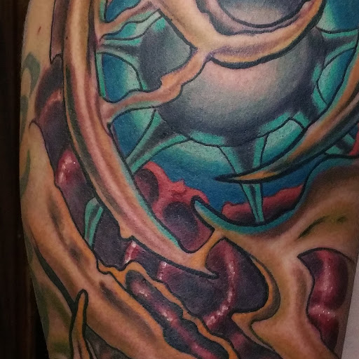 Explore anime leg tattoo ideas, creative tattoo ideas in Casper, available at Final Thoughts