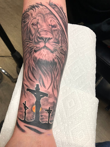 Explore hunter hunter tattoo ideas, creative tattoo ideas in Spokane, available at Platinum Rose Tattoo Studio