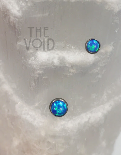 Explore above eyebrow tattoo ideas, creative tattoo ideas in Brattleboro, available at The Void