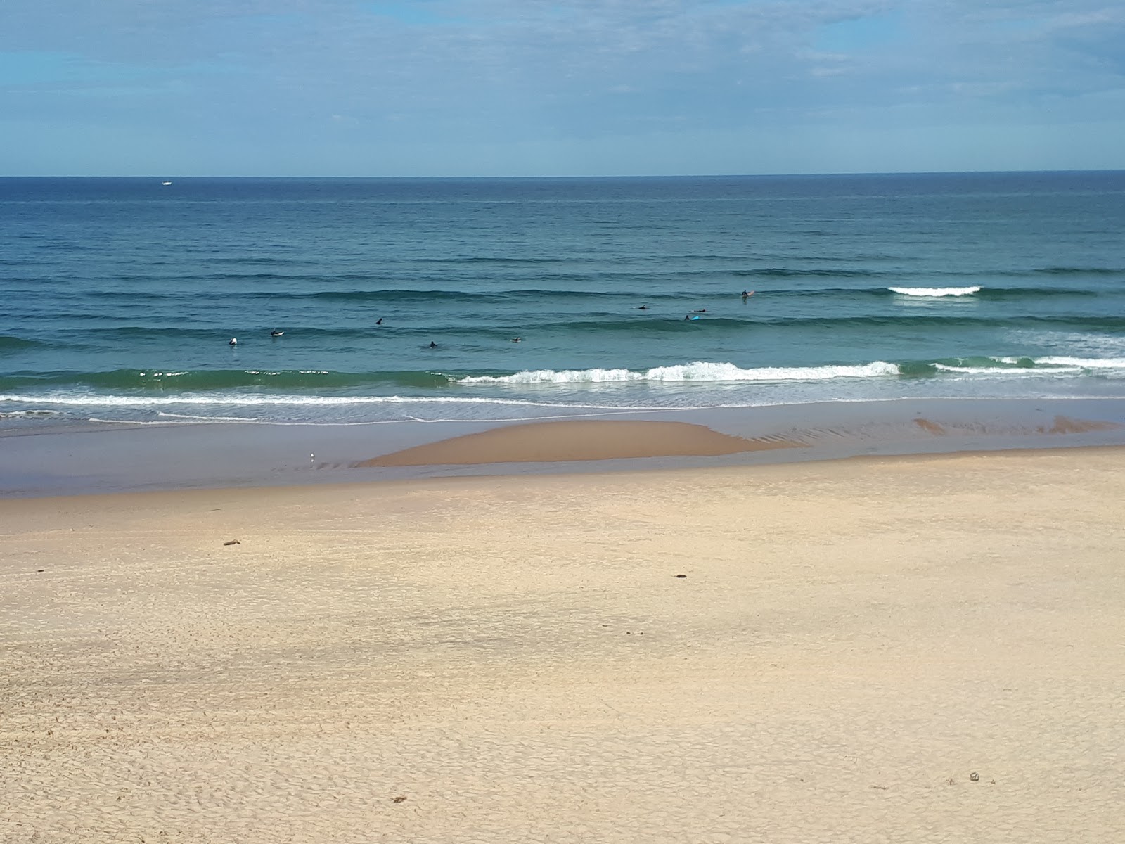 Photo de Le Pin beach avec l'eau cristalline de surface
