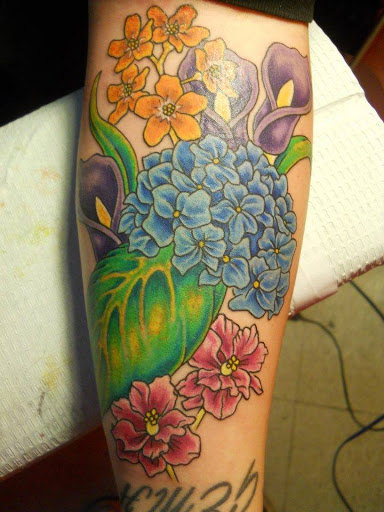 Tattoo Shop «Magnum Tattooing», reviews and photos, 2317 Division Ave S, Grand Rapids, MI 49507, USA