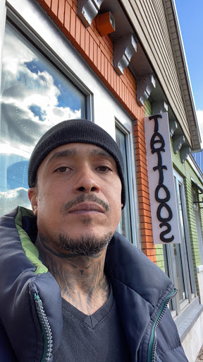 Explore black and white voodoo/ragdoll broken heart tattoo ideas, creative tattoo ideas in Indianapolis, available at A-1 Art Tattoos LLC