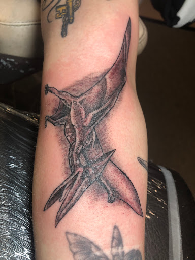 Explore sound wave tattoo ideas, creative tattoo ideas in Calumet, available at Tattooing by Big Ben
