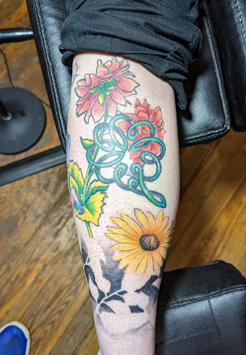 Explore rose and butterfly tattoo ideas, creative tattoo ideas in Leesburg, available at 1757 Ink