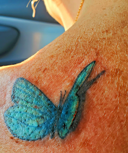 Explore smile tattoo ideas, creative tattoo ideas in Dripping Springs, available at Hill Country Arts Piercings And Tattoos