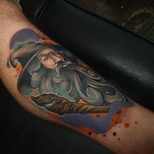 Find between the boob tattoo ideas for your next unique tattoo in Valdosta at Acid Ink Tattoos