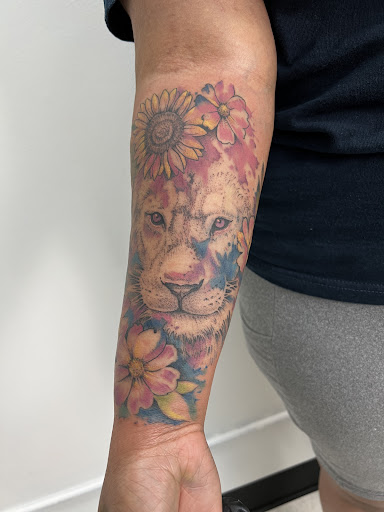 Explore wrap around tattoo ideas, creative tattoo ideas in Santa Clara, available at Vampire Battle Mansion Tattoo and Piercing