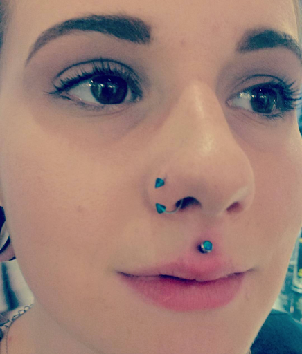 Explore naked women tattoo ideas, creative tattoo ideas in Green Bay, available at Colourbox Body Piercing Llc